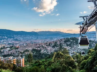 Aerial gondola car in the air overlooking the city of Medellin, Colombia.