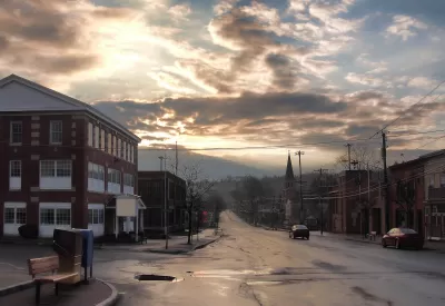 View of street in small town of Camillus, New York on a cloudy day.