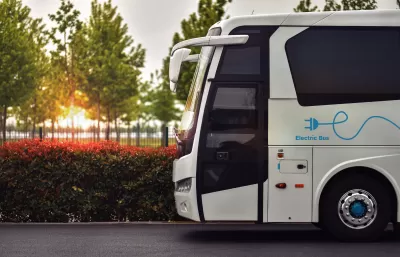 Close-up of front side of white electric bus