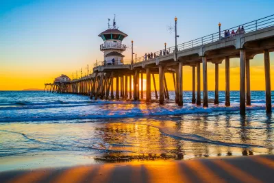 Huntington Beach, CA pier at sunset.