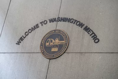 Sign on concrete wall "Welcome to Washington Metro" with WMATA seal.