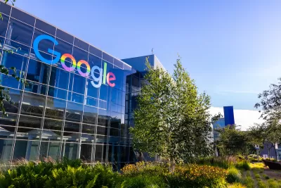 Glass office building with multicolored Google logo on Google headquarters campus in Mountain View, California