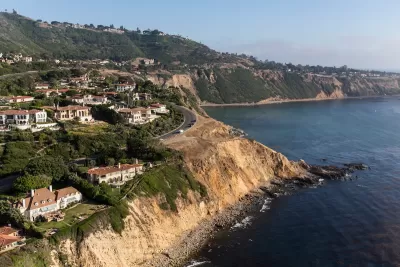 Aerial view of Rancho Palos Verdes coastal community with large homes on coastal bluffs on Pacific Ocean.