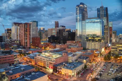 Aerial view of Denver, Colorado skyline at dusk.