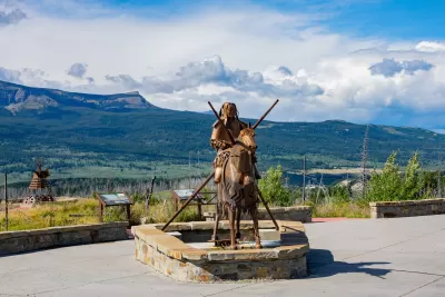 Blackfoot memorial statue in Glacier National Park of Native American sitting on horse