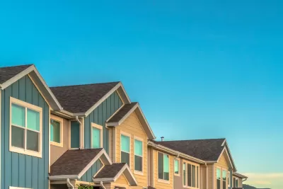 View of upper story of row of townhomes.