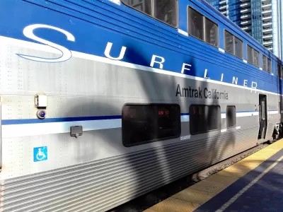 Blue and silver Pacific Surfliner train at platform in San Diego, California.