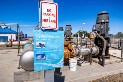 Sign about water purification process mounted on water treatment plant in Santa Clara, California