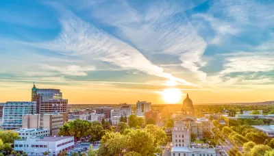 View of Boise, Idaho timeline with state capitol dome against early sunset sky