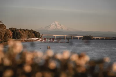 View of Interstate 205 bridge over Columbia River with Mt. Hood in background.