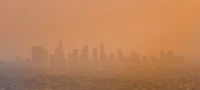 View of downtown Los Angeles, California through orange haze.