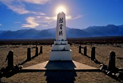 White obelisk monument with Japanese writing at Manzanar Historic Site, former internment camp, California