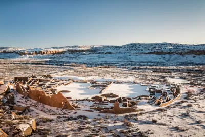 Native American ruins at Chaco Culture National Historical Park in winter with snow.