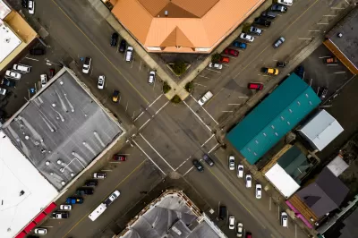 Aerial view of strip mall with diagonal parking spots in Coquille, Oregon
