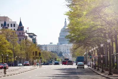 View down Pennsylvania Avenue with U.S. capitol in background and bike lane in middle of street