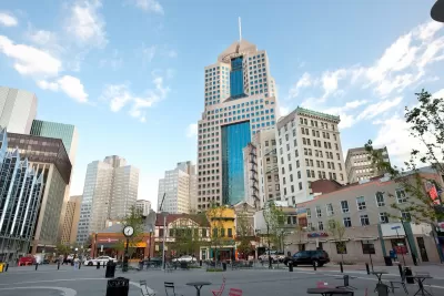 Pedestrianized public square surrounded by streets and tall buildings in Pittsburgh, Pennsylvania.