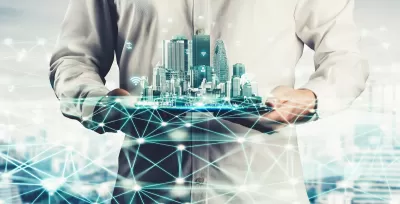 Digital drawing of person holding city skyline with wifi symbols and lines indicating smart cities or data.