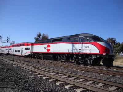 White and red Caltrain commuter train