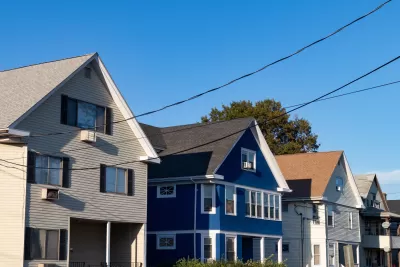 Row of two-story traditional wood houses in Stamford, Connecticut