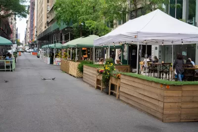 Outdoor dining patios on street closed to car traffic in New York City