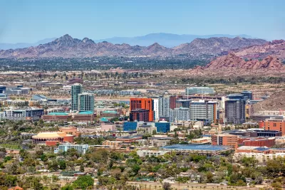 Aerial view of Tempe, Arizona with mountains in background