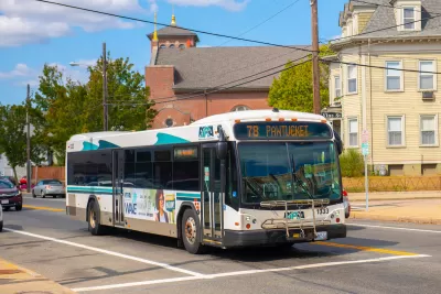 White and green Rhode Island Public Transit Agency bus