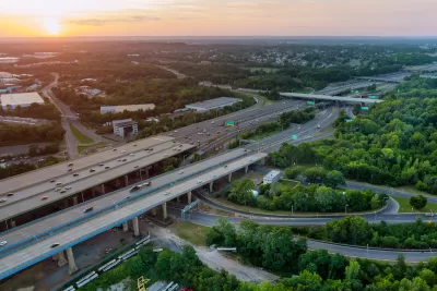 Aerial view of elevated freeways in New Jersey at dusk.