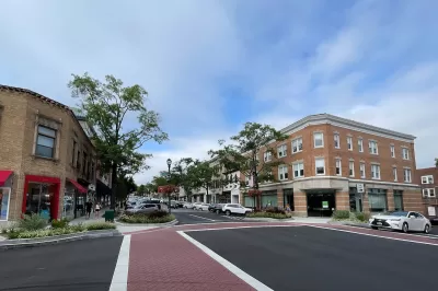 View of empty brick crosswalk in shopping district in Greenwich, Connecticut
