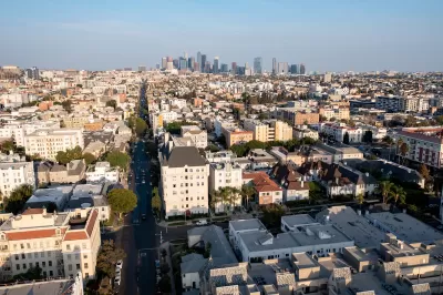 Aerial view of residential buildings in Koreatown, Los Angeles with downtown skyline in background