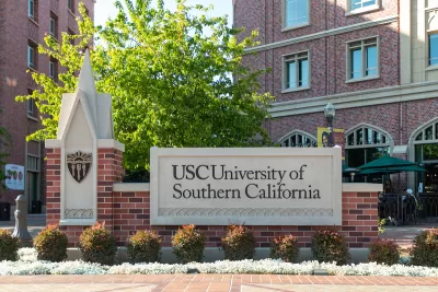 Brick "USC University of Southenr California" sign at entrance to campus