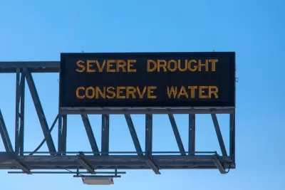 "Severe Drought - Conserve Water" freeway sign.