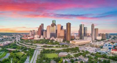 Aerial view of Houston, Texas skyline at golden hour.