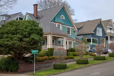 Teal and blue two-story houses in Seattle's historic Queen Anne neighborhood