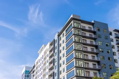 Multifamily building with blue sky in the background.