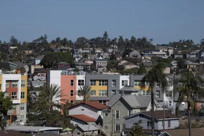View of dense San Diego neighborhood with multi-family buildings.