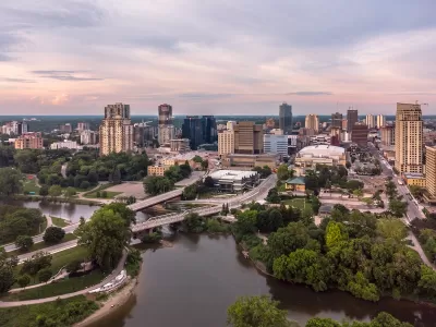 Aerial view of London, Ontario with river in foreground.