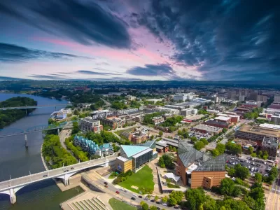 Aerial view of Chattanooga, Tennessee with a colorful sunset sky.