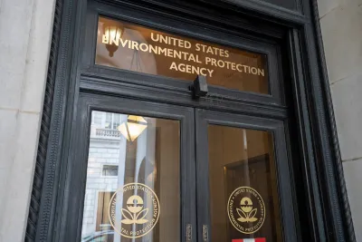 Door of government building with gold Environmental Protection Agency title.