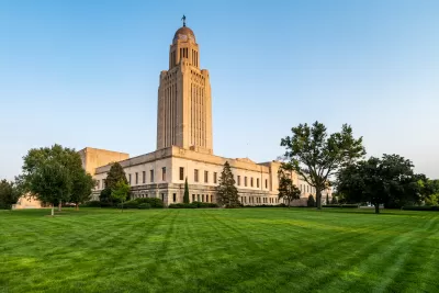 Nebraska capitol building against a blue sky