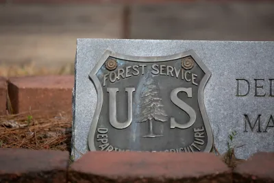 Close-up on U.S. Forest Service plaque.