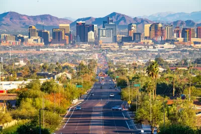 Phoenix, Arizona skyline with mountains in background.
