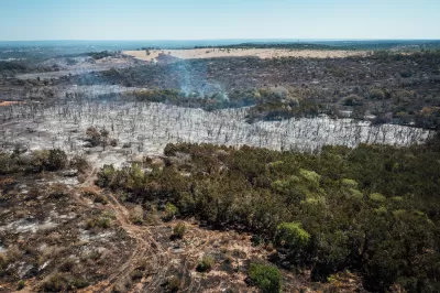 Aerial view of scorched forest area in Round Mountain, central Texas