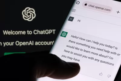 close-up of person using ChatGPT app on mobile phone.