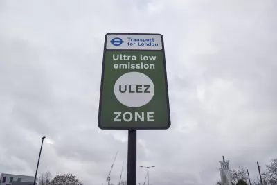 Close-up of green "Ultra low emission zone" ULEZ sign in London, UK.