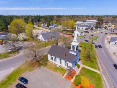 Aerial view of Trinity United Church aerial view at 103 Lafayette Road at Main Street in Seabrook historic town center, New Hampshire NH, USA.
