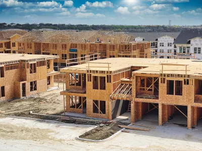 Wood-frame two-story housing under construction