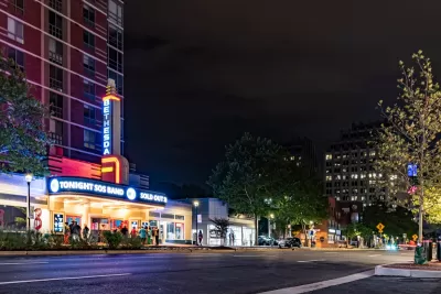 Night view of vintage theater with neon marquee in Bethesda, Maryland.