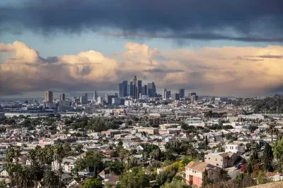 View from hilltop residential neighborhood of downtown Los Angeles, California on a cloudy day.