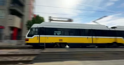 Blurred image of speeding DART light rain train in Dallas, Texas