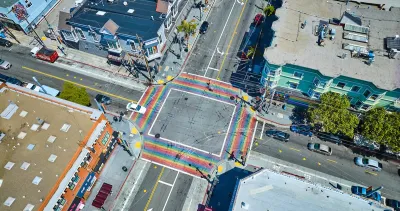 Aerial of rainbow painted crosswalks at large intersection in Castro District, Sna Francisco, California.